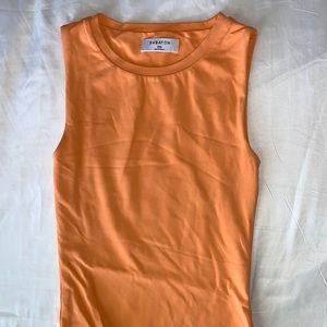 Aritzia orange bodysuit